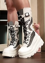 Bailey's feet with her white boots on is ready to give you a hot and sloppy foot job