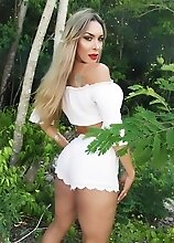 White shorts and small top outdoors